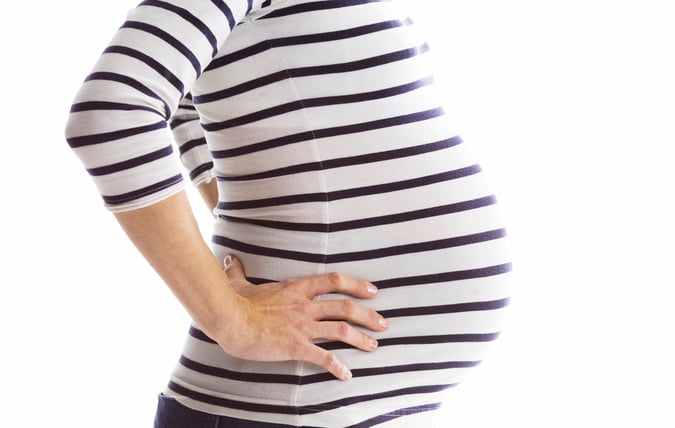 Mage på gravid kvinna